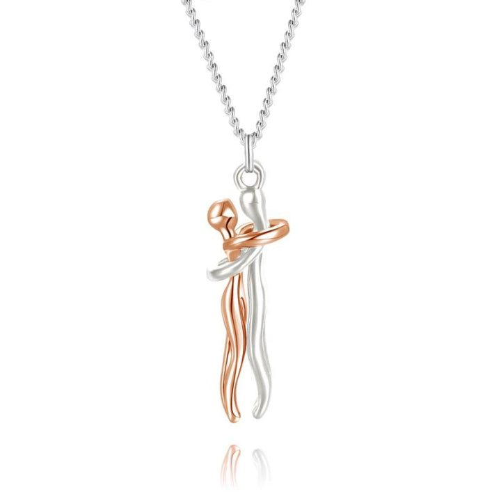 Zilverkleurige Omhelzing ketting, tijdloos unisex sieraad van RVS voor duurzame liefde & verbondenheid.