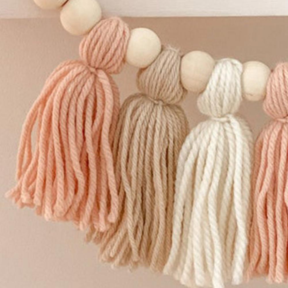 Rustgevende wanddecoratie: houten babyslinger voor baby- en kinderkamer.