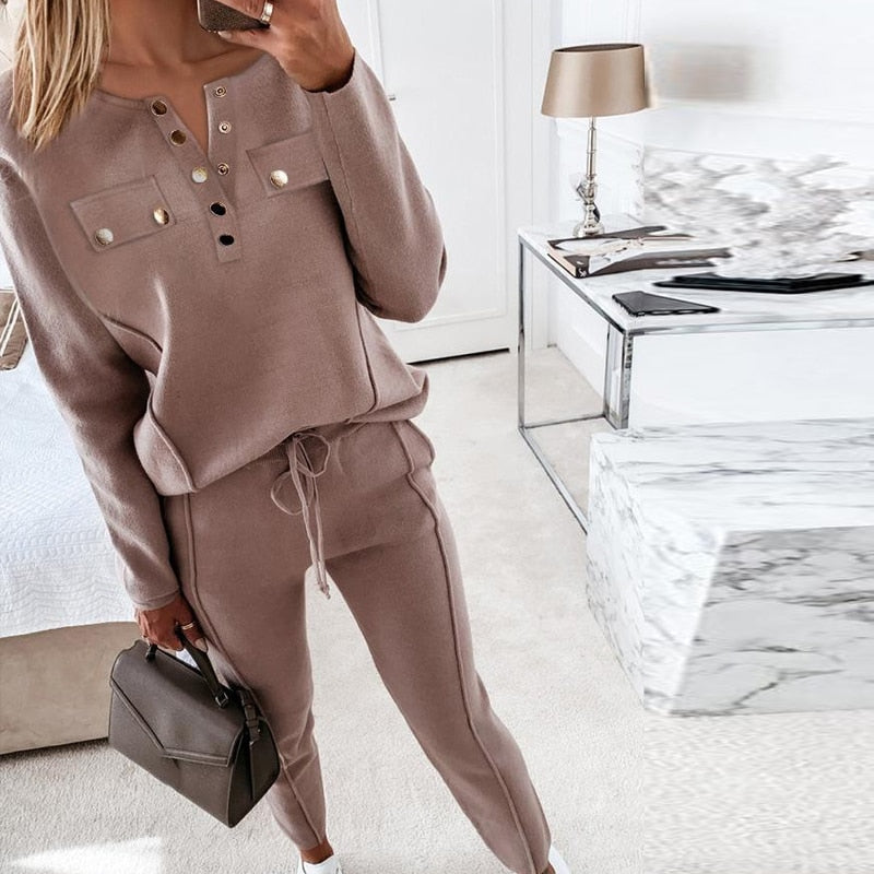 Bruin LaurasPakje tweedelig damespak, comfortabele en zakelijke kledingset, perfect voor de moderne vrouw.
