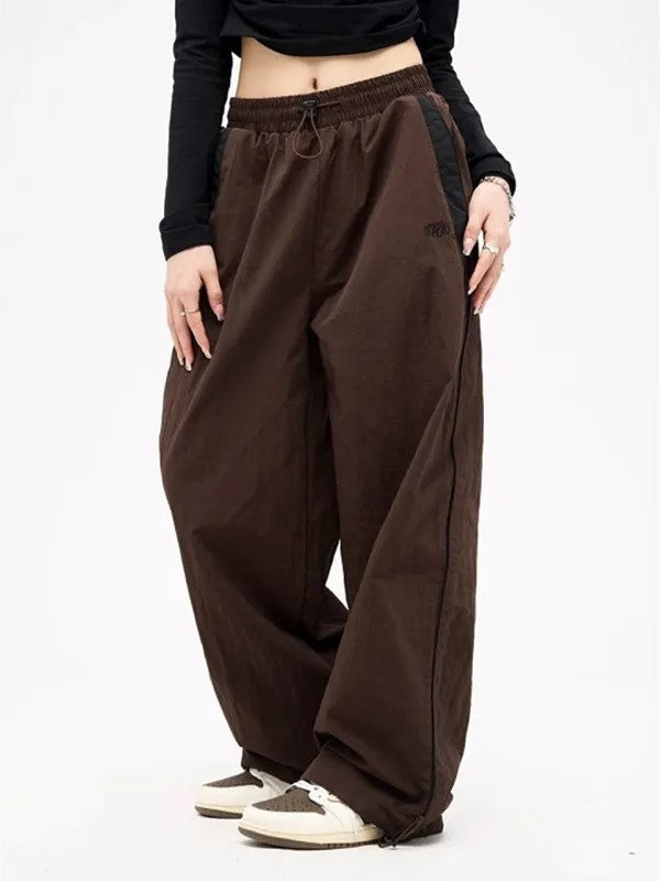 Dames baggy joggingbroek met hoge taille en losse pasvorm. Comfortabele sportbroek voor elke dag.