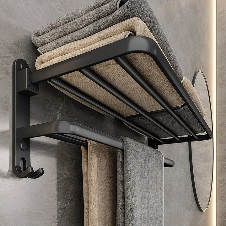 Compact mat zwart inklapbaar handdoekenrek voor badkamer, ruimtebesparend stalen wandrek met modern design.