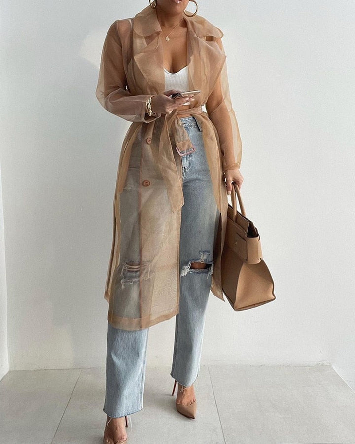 Dames transparante trenchcoat met knoopsluiting, een veelzijdige en trendy toevoeging aan je garderobe.