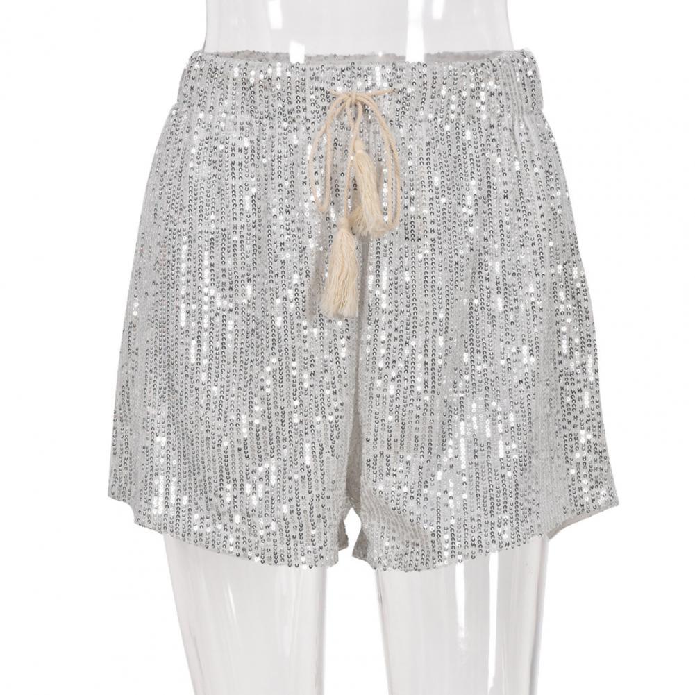 Nauwsluitende zilveren glitterbroek voor dames. Comfortabele Serenas avondkleding, perfecte pasvorm.