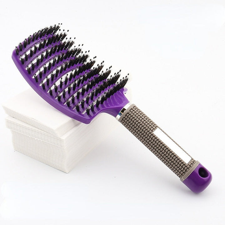 Ontklitborstel met flexibele pinnen voor een zachte hoofdhuidmassage en glad haar.