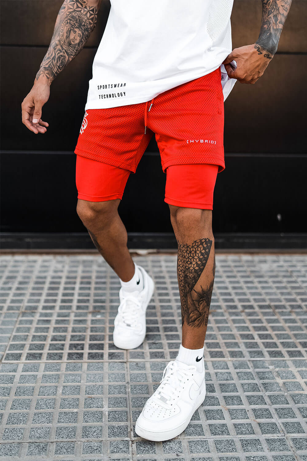 Verbeter je training met deze vochtregulerende heren 2-in-1 sportshorts en optimale comfort.