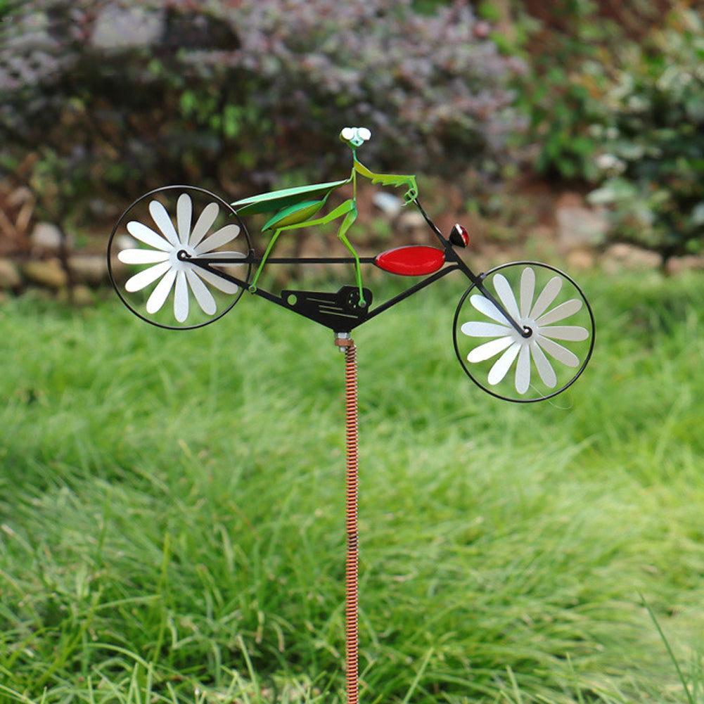 Vrolijke tuindecoratie windmolen: fietsend dier brengt plezier en kleur in elke tuin, een uniek tuinornament.