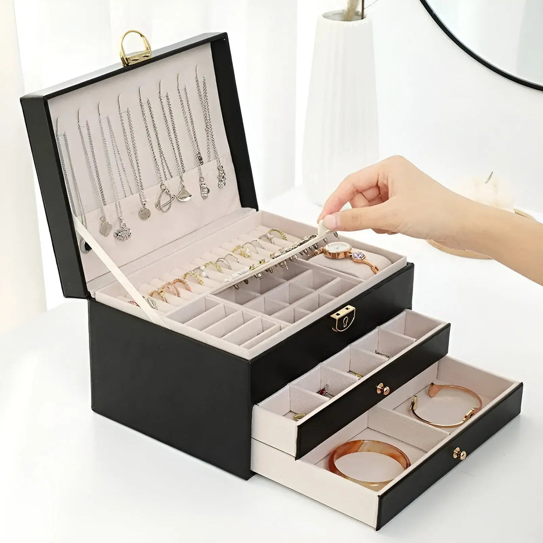 Luxe meerlaagse sieradendoos van PU-leer voor dames. Stijlvolle organisatie van juwelen en accessoires op kaptafel.