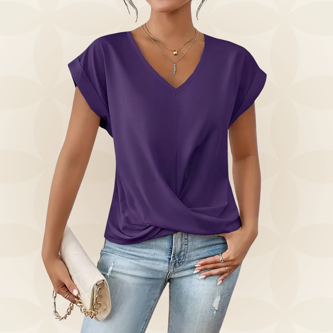 Gedrapeerd detail op elegante dames V-hals top. Modieuze korte mouw top, ideaal voor zomer/lente.