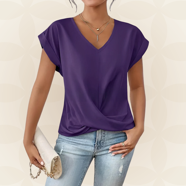 Gedrapeerd detail op elegante dames V-hals top. Modieuze korte mouw top, ideaal voor zomer/lente.
