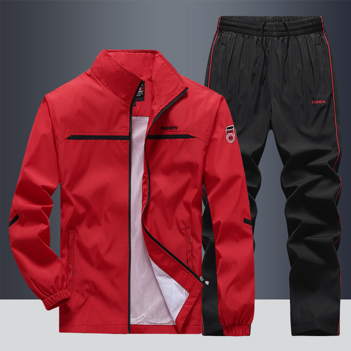 Heren trainingspak met sportief design, ultiem draagcomfort. Ideaal voor actieve mannen die stijl en functionaliteit zoeken.