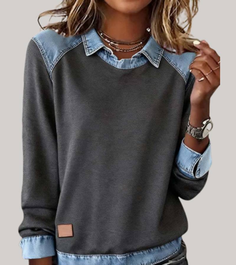 Elegante damestrui met opvallende contrastkraag, perfect voor een modieuze herfstlook.