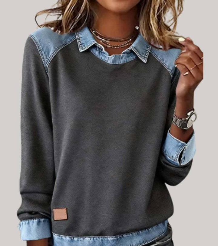 Elegante damestrui met opvallende contrastkraag, perfect voor een modieuze herfstlook.