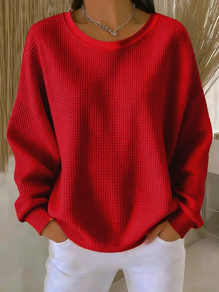 Warme herfst gebreide trui met textuur, oversized pasvorm en ronde hals. Perfect voor comfort op koelere dagen.