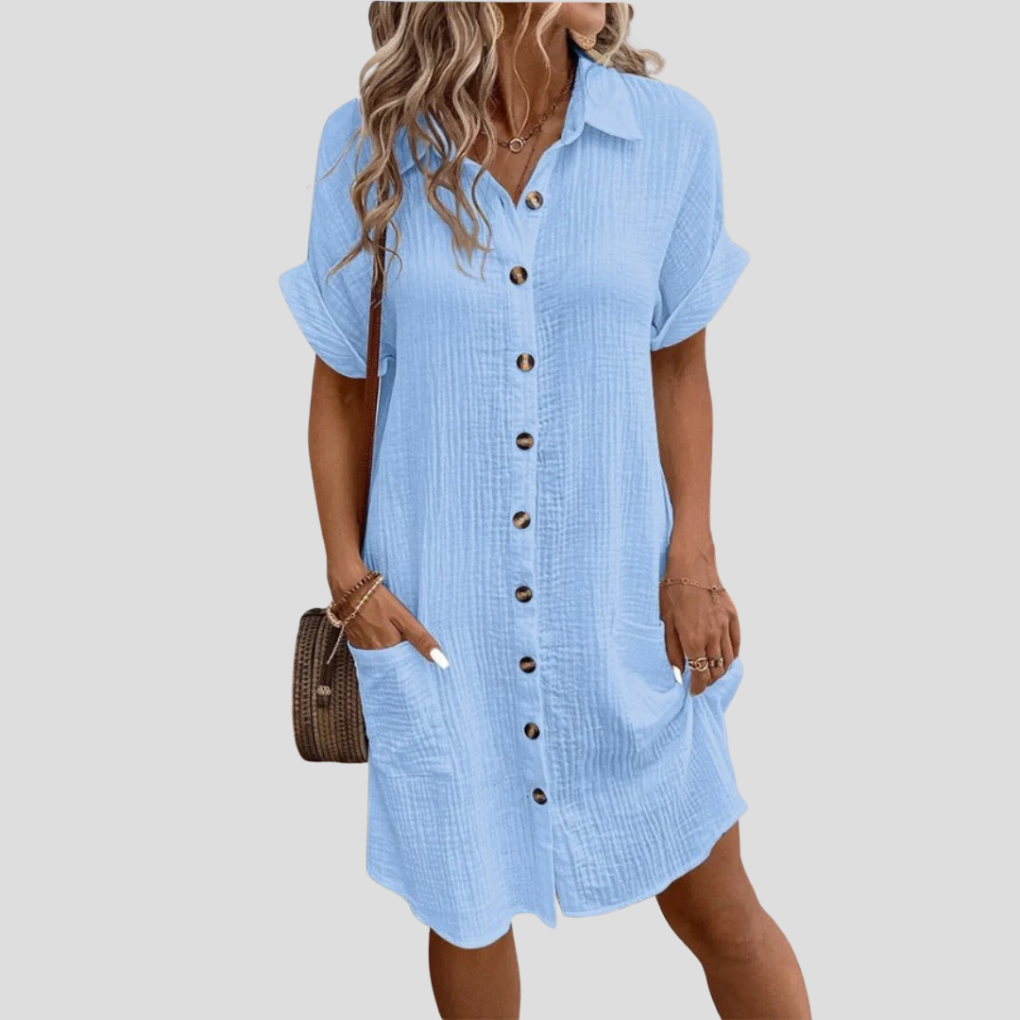 Comfortabele dames blousejurk met klassieke kraag, een stijlvolle midi overhemdjurk met knoopsluiting.