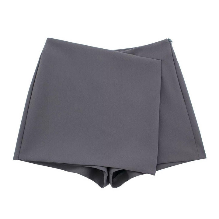 Lente-proof dames rokbroek, modieus en praktisch, met asymmetrische voorkant.