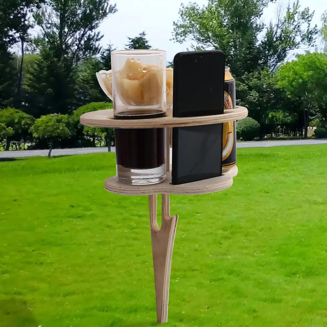 Geniet van buitenleven met deze compacte opvouwbare wijntafel. Essentiële tuin- en strandaccessoire.