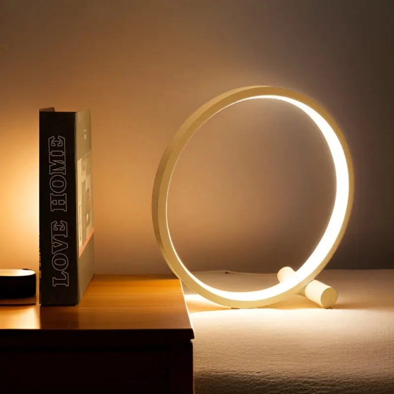 Moderne dimbare LED nachtlamp LumaCircle, ideaal voor sfeervolle verlichting op nachtkastje in zwart of wit.