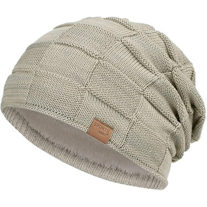 Warme gebreide wintermuts Luca, een comfortabele unisex slouch beanie met zachte fleece. Ideaal voor alle winteractiviteiten.