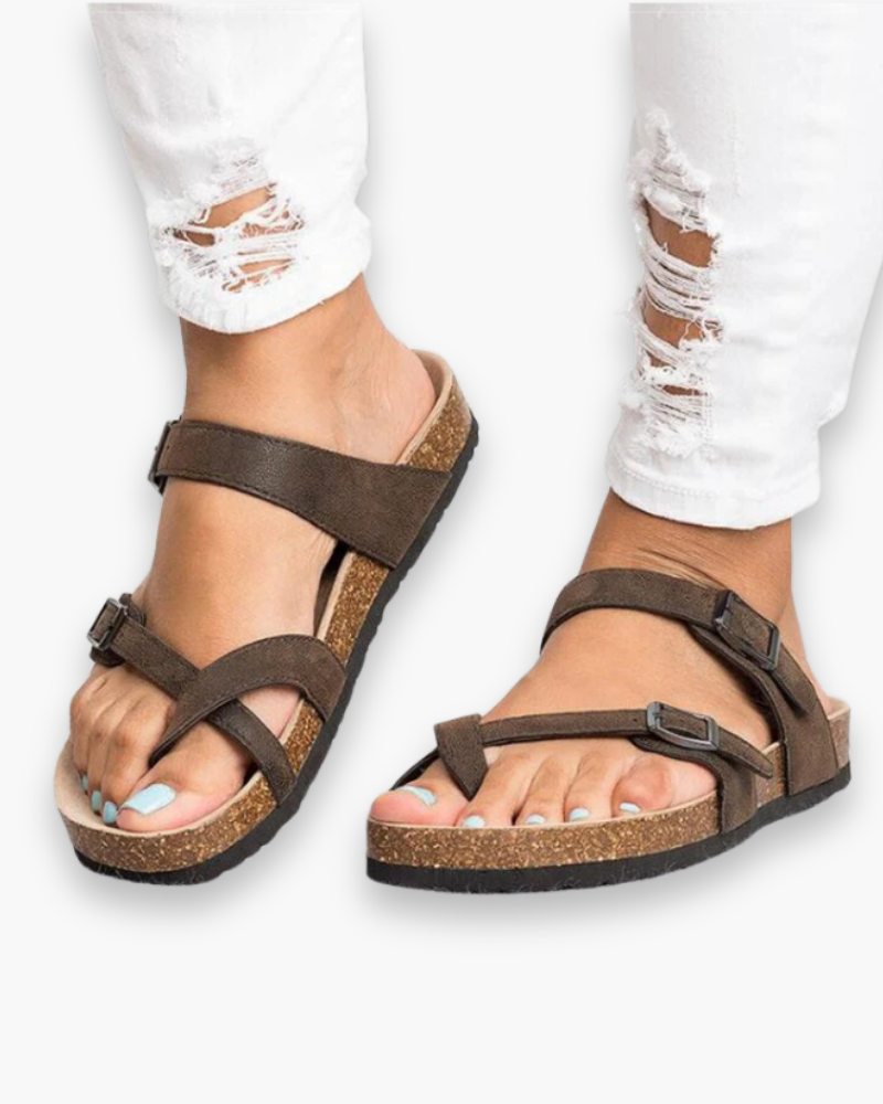Elegante platte dames sandalen met verstelbare banden. Perfecte zomerse voetmode voor strand of casual gelegenheden.