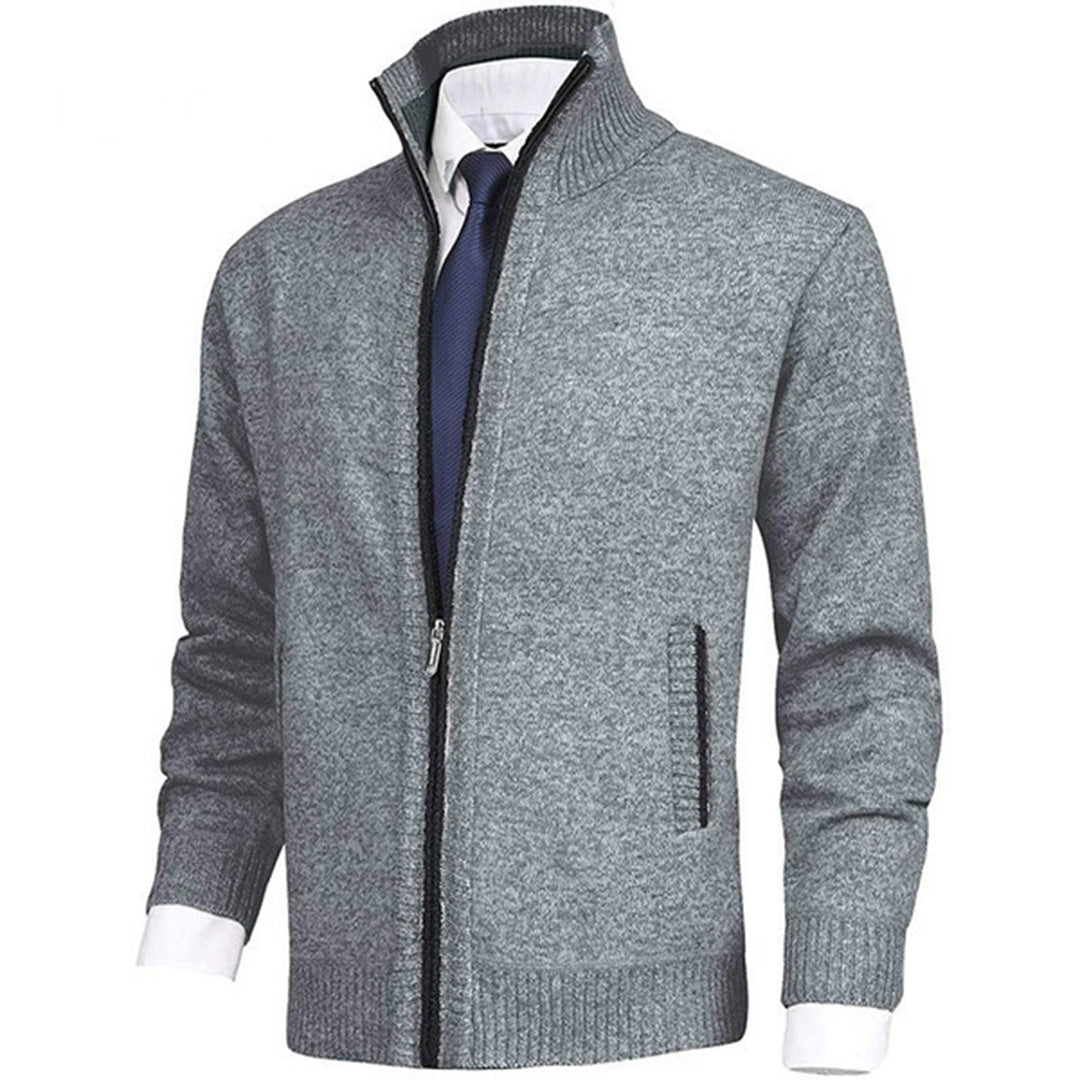 Detail van de elastische zoom en manchet van dit comfortabele herenvest met rits. Kwaliteitsvolle mannenmode.