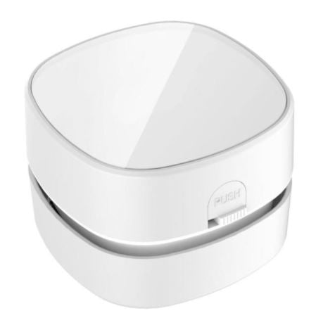 Compacte mini stofzuiger in actie, zuigt kruimels op een toetsenbord, toont gebruiksgemak.