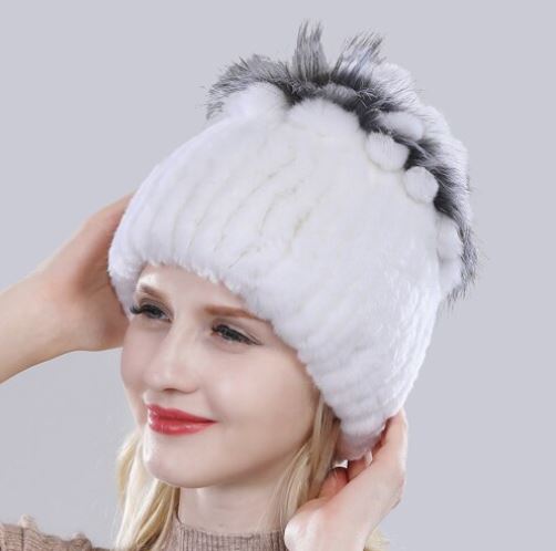 Comfortabele grijze dames bontmuts, perfect voor warmte en stijl tijdens de koude wintermaanden.
