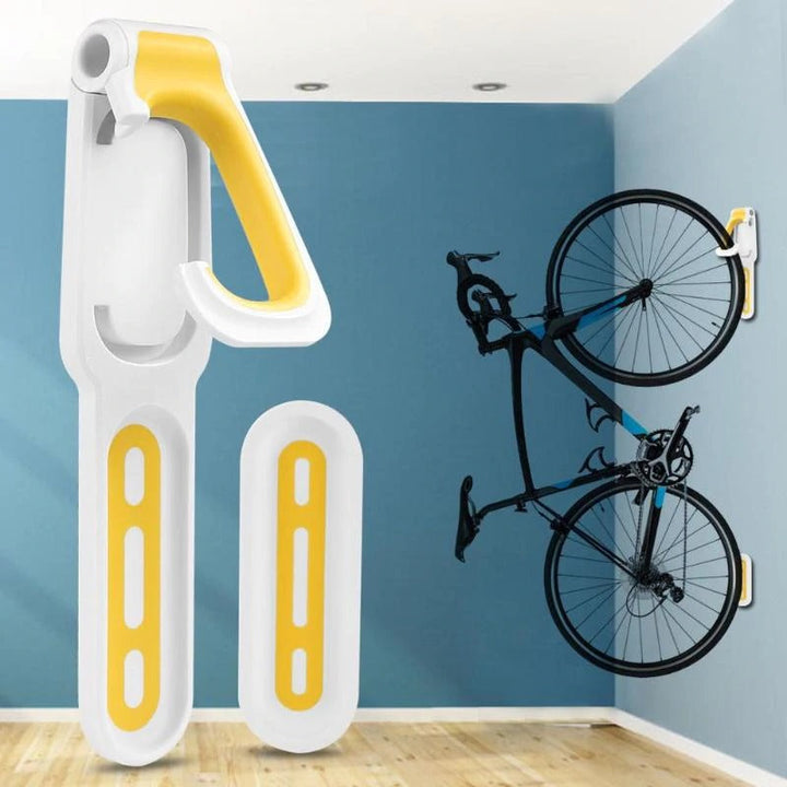 Veilige wandgemonteerde fietsbeugel voor georganiseerde en compacte fietsopslag, inclusief muurbescherming.