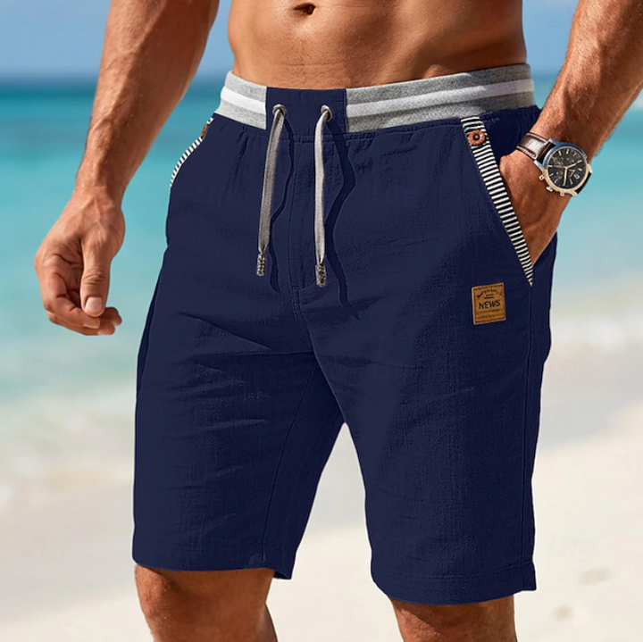 Stijlvolle lichtgewicht heren strandshort met trekkoord. Perfect voor zomerse ontspanning, zowel casual als op het strand.