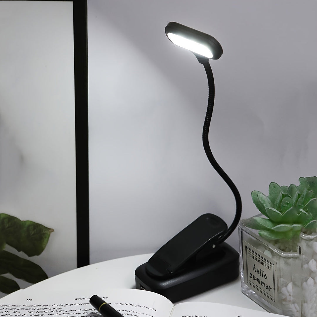 Compacte bedlamp met clip en flexibele hals, draagbare leeslamp voor comfortabel lezen in elke positie.