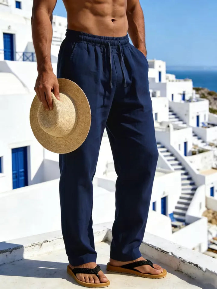 Beige linnen herenbroek met elastische taille. Comfortabele rechte pijp, ideaal voor strand of stad.