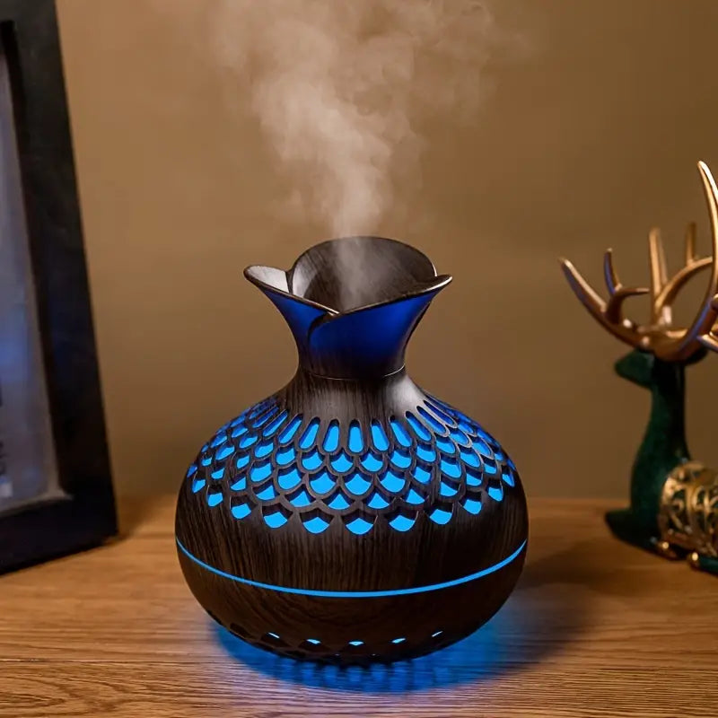Moderne AromaBloom diffuser met LED sfeerlicht, ideaal voor aromatherapie, welzijn en een ontspannen thuis.