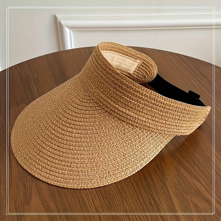 Dames opvouwbare zonneklep met brede rand, lichtgewicht en UV-beschermend, ideaal voor zomer en strand.