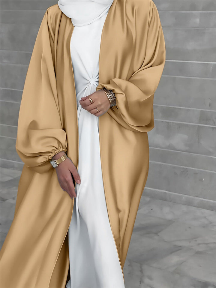 Stijlvolle lange abaya jurk met riem voor dames. Geschikt voor zowel formele als casual modest outfits.