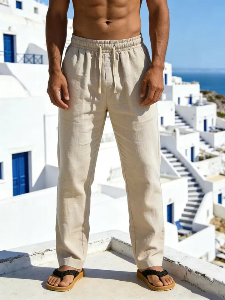 Zwarte linnen chino voor heren met rechte pijp. Comfortabele elastische taille voor een relaxte pasvorm.