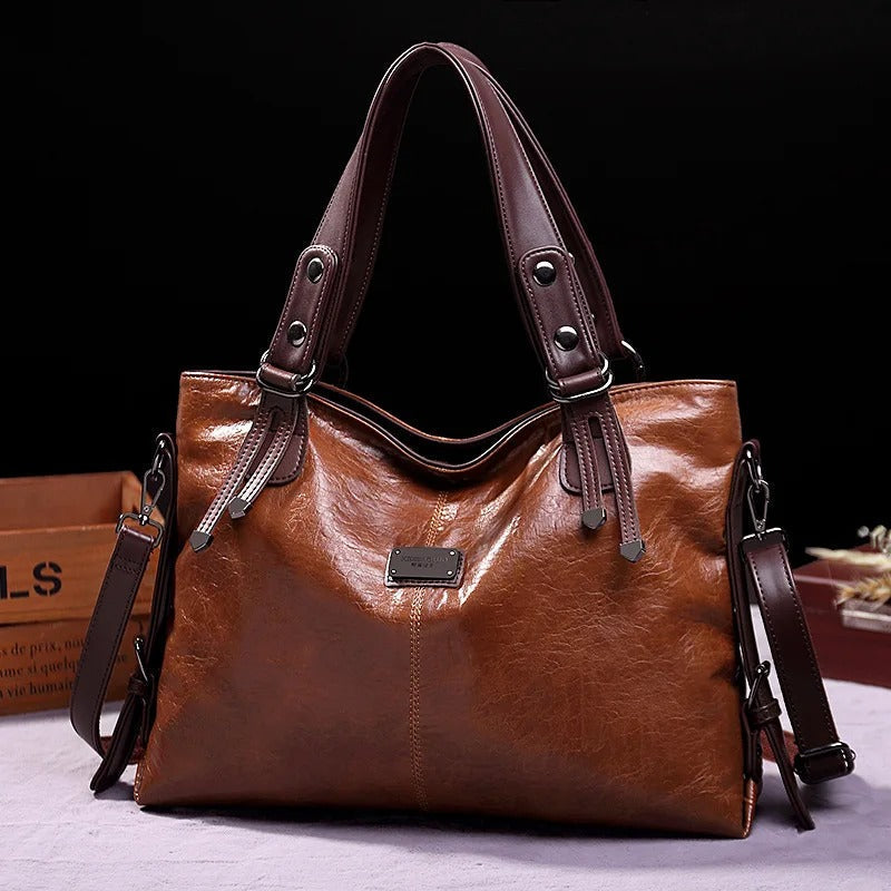 Ruime vintage leren dames schoudertas met zacht leer, perfect voor dagelijkse essentials en modieus.