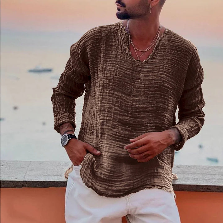Stijlvol heren shirt met V-hals en effen patroon, perfect voor warme zomerdagen. Casual en ademend comfort.