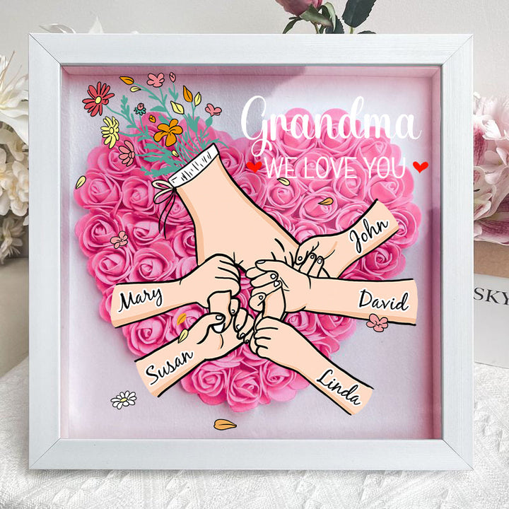 Uniek interieurstuk: gepersonaliseerde bloemen met namen in een houten acryl schaduwbox voor mama.
