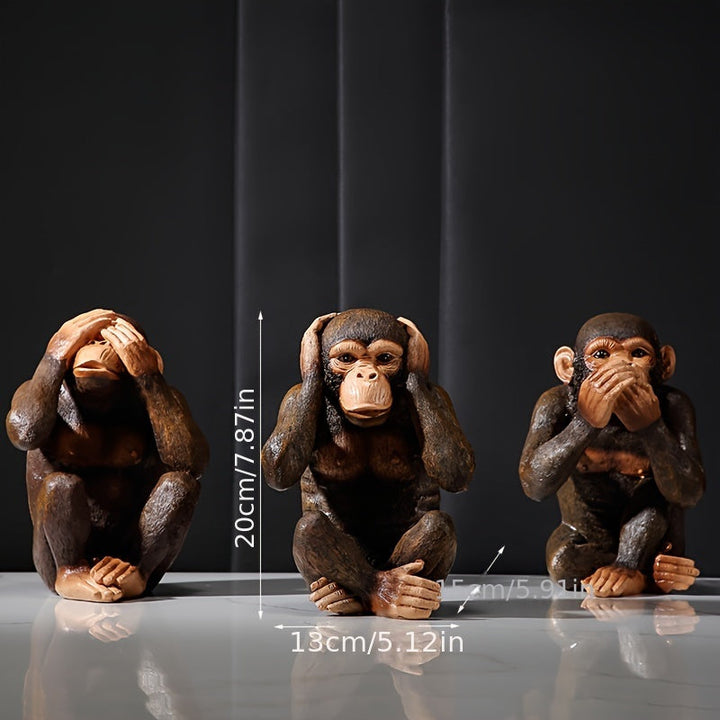 Chimpansee beeldjes van duurzaam hars, perfect voor een speelse touch in huis of tuin.