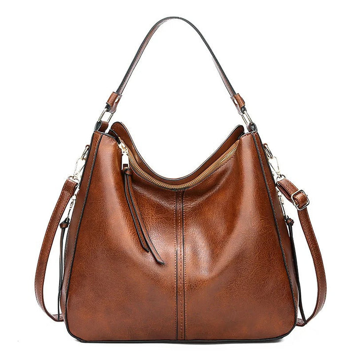 Bruine elegante dames crossbody tas; stijlvol, functioneel en tijdloos mode accessoire voor elke vrouw.