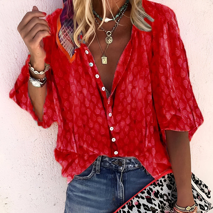 Comfortabele dames blouse met losse pasvorm en knoopsluiting. Ideaal voor een relaxte maar stijlvolle dagelijkse look.