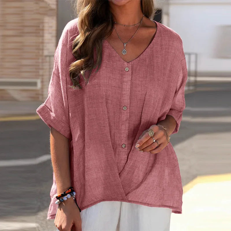 Modieuze dames blouse met knopen en V-hals, relaxte pasvorm. Comfortabele 3/4 mouw top, effen kleur.