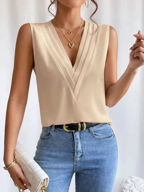 Modieuze mouwloze dames top, perfect voor warme dagen of als kantoorkleding.