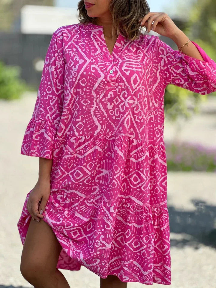 Zomerse gelaagde midi-jurk met print, losse pasvorm en bohemian flair voor elke gelegenheid.