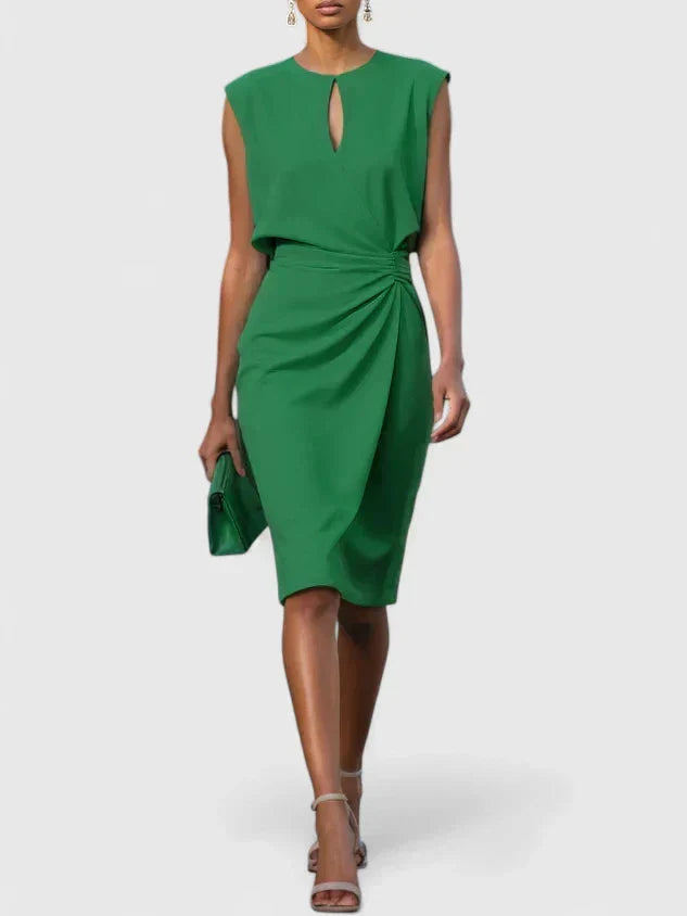 Elegante mouwloze midi jurk met stijlvolle keyhole hals en wijdvallende plooirok; ideaal als feestjurk.