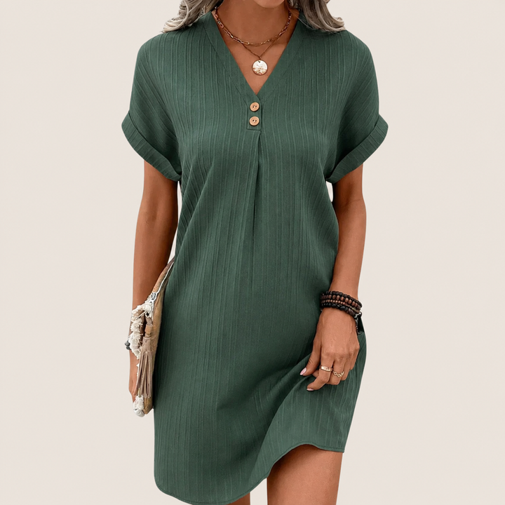 Flatterende dames V-hals mini jurk met elegante knoopdetails, perfect voor een stijlvolle zomerlook.