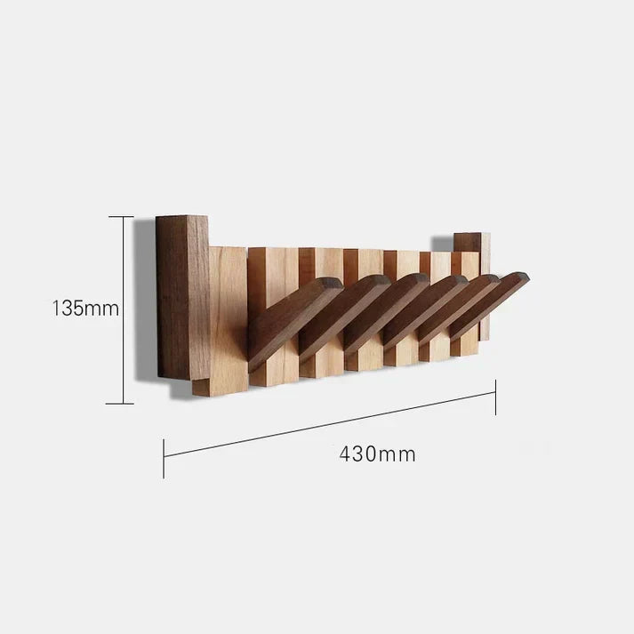 Decoratieve wandkapstok 'Piano' voor thuis, biedt slimme opbergruimte in een elegant jasje.