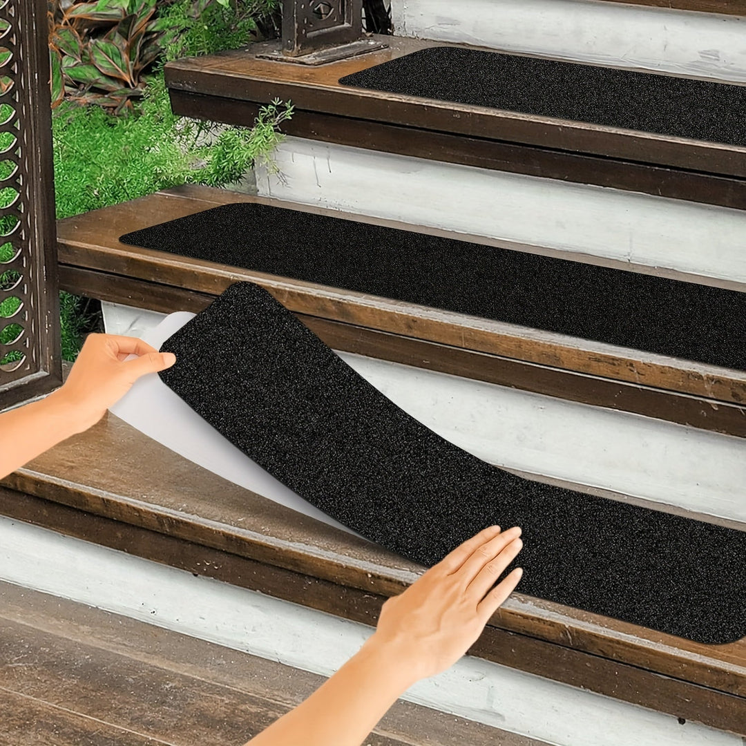 Zwarte 10-pack antislip trapstrips met sterke grip voor veilige trappen binnen en buiten, voorkomt uitglijden.