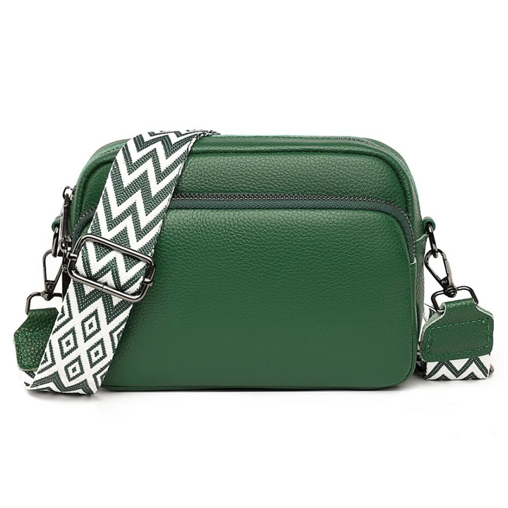 Compacte leren crossbody tas voor dames, perfect als schoudertas accessoire.