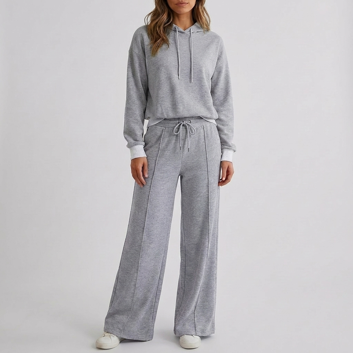 Stijlvolle dames tweedelige set met relaxte pasvorm, hoodie en wijde broek, voor een moderne look.