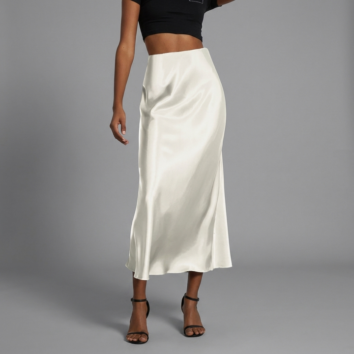 Vloeiende satijnen midi rok voor dames, elegant en comfortabel, geschikt voor diverse stijlen, van zakelijk tot feest.